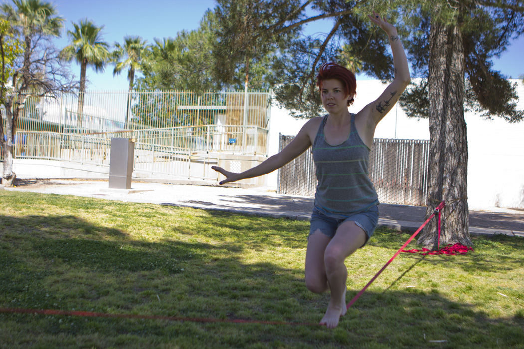 Ashley Fortune, 25, used slack line, similar to tightrope walking, to work on her core strength and to meditate at Himmel Park in Tucson on a mild Monday afternoon.
