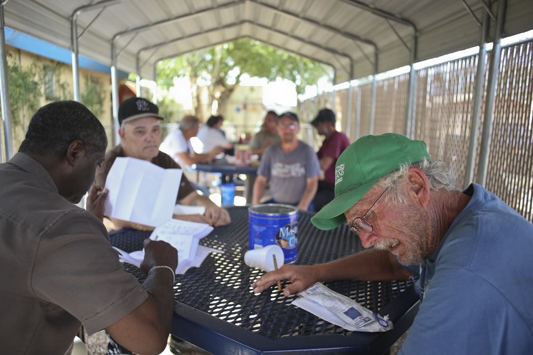 George Littrell, right, has been homeless for the past 13 months. The Vietnam War veteran, 65, is stationed at the Gospel Rescue Mission in Tucson.